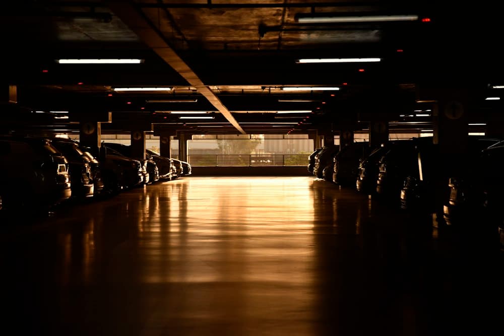 Rows of cars in a covered multi-storey car park